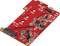 Ruwe elektronische printplaat met meerdere zwarte en zilveren componenten, zichtbare schakelingen en een USB-C-aansluiting.