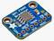 Een kleine, rechthoekige elektronische module met het opschrift 'SPI FRAM Breakout'. Het vertoont meerdere aansluitingen en geïntegreerde schakelingen.
