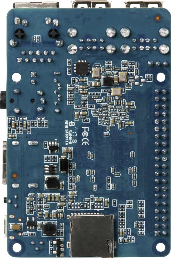 Achterkant van een elektronische printplaat met verschillende chips, soldeerplaatsen en aansluitingen op een blauwe PCB, vermoedelijk een microcontrollerbord.