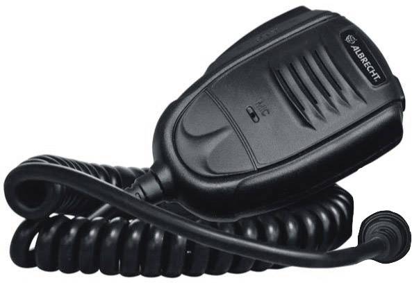 Een zwarte handmicrofoon met golvend snoer, geschikt voor radioapparatuur, ligt opgerold op een oppervlak.