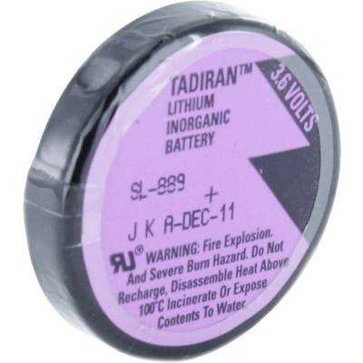 Ronde lithiumbatterij met opschrift 'Tadiran', 3,6 Volt. Waarschuwingen: Explosiegevaar, niet opladen of uit elkaar halen.
