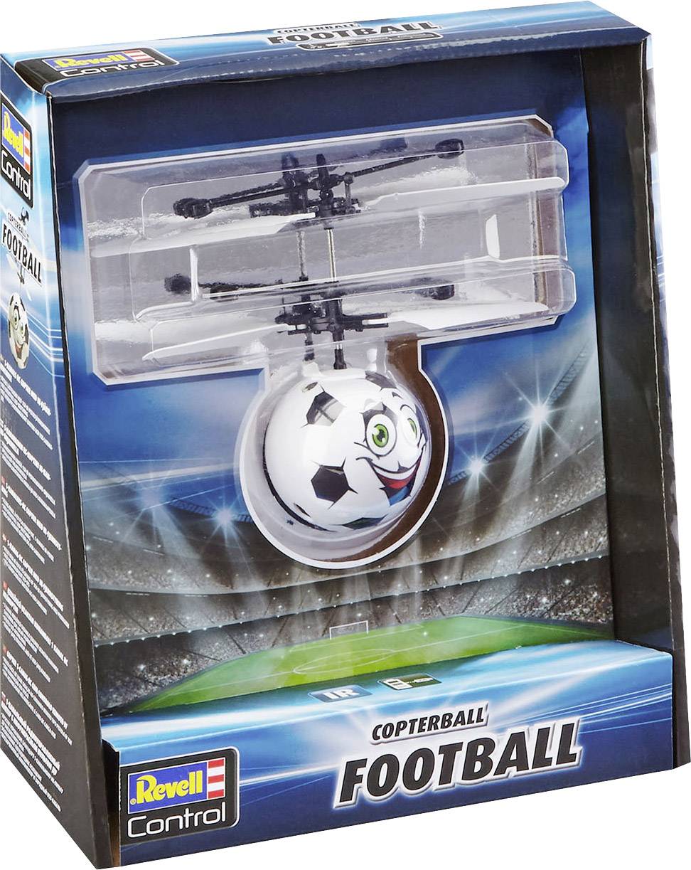'Speelgoed-helikopterbal in voetbalstijl met gezicht', in verpakking, voor stadionachtergrond, merk 'Revell Control'.