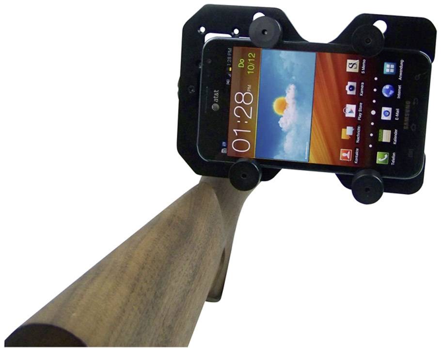 Een smartphone is gemonteerd op een houten statief. Het scherm toont de tijd 01:28, de datum Do 10/12 en verschillende app-symbolen.