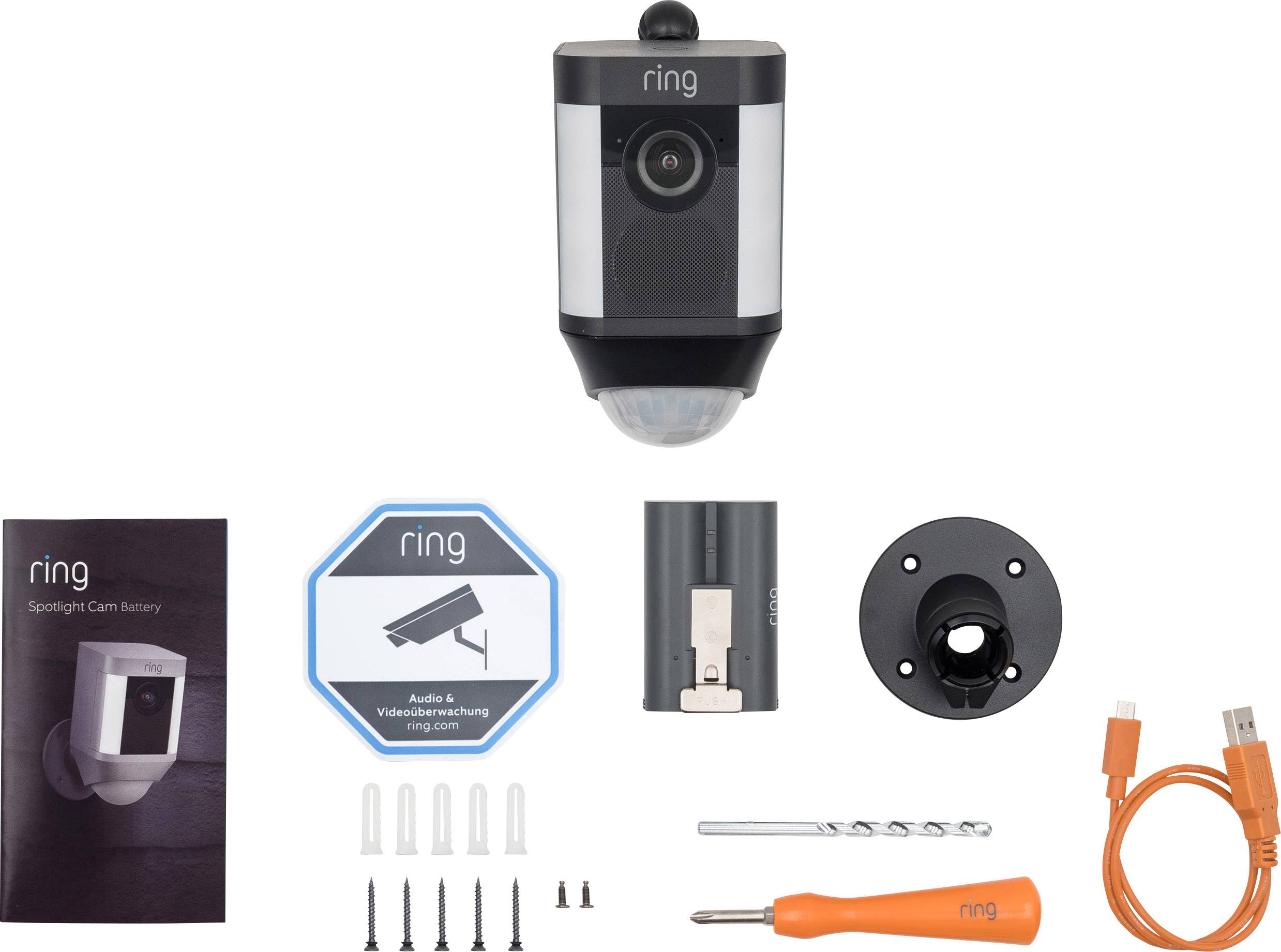 Productfoto van bewakingscamera met toebehoren: camera, wandbeugel, schroeven, boor, schroevendraaier, handleiding en USB-kabel.
