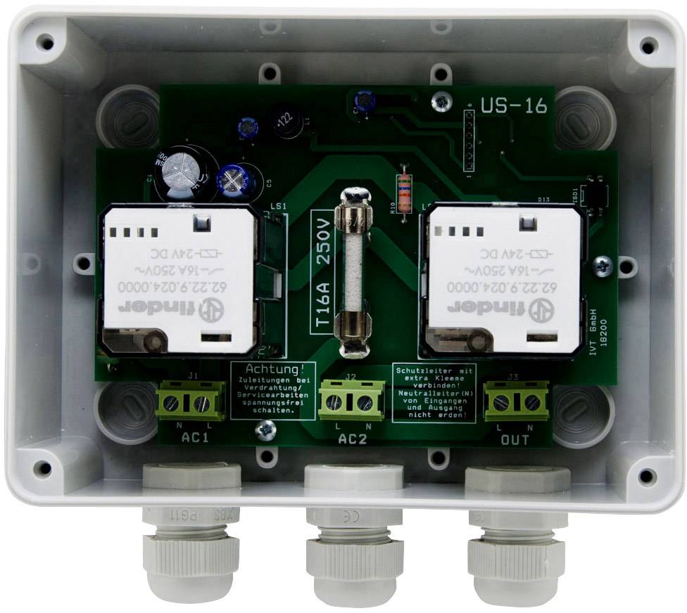 Elektronische schakeling in een open behuizing met twee zekeringen, voorzien van de labels 'AC1', 'AC2', 'OUT' en een groot T16A zekeringselement.