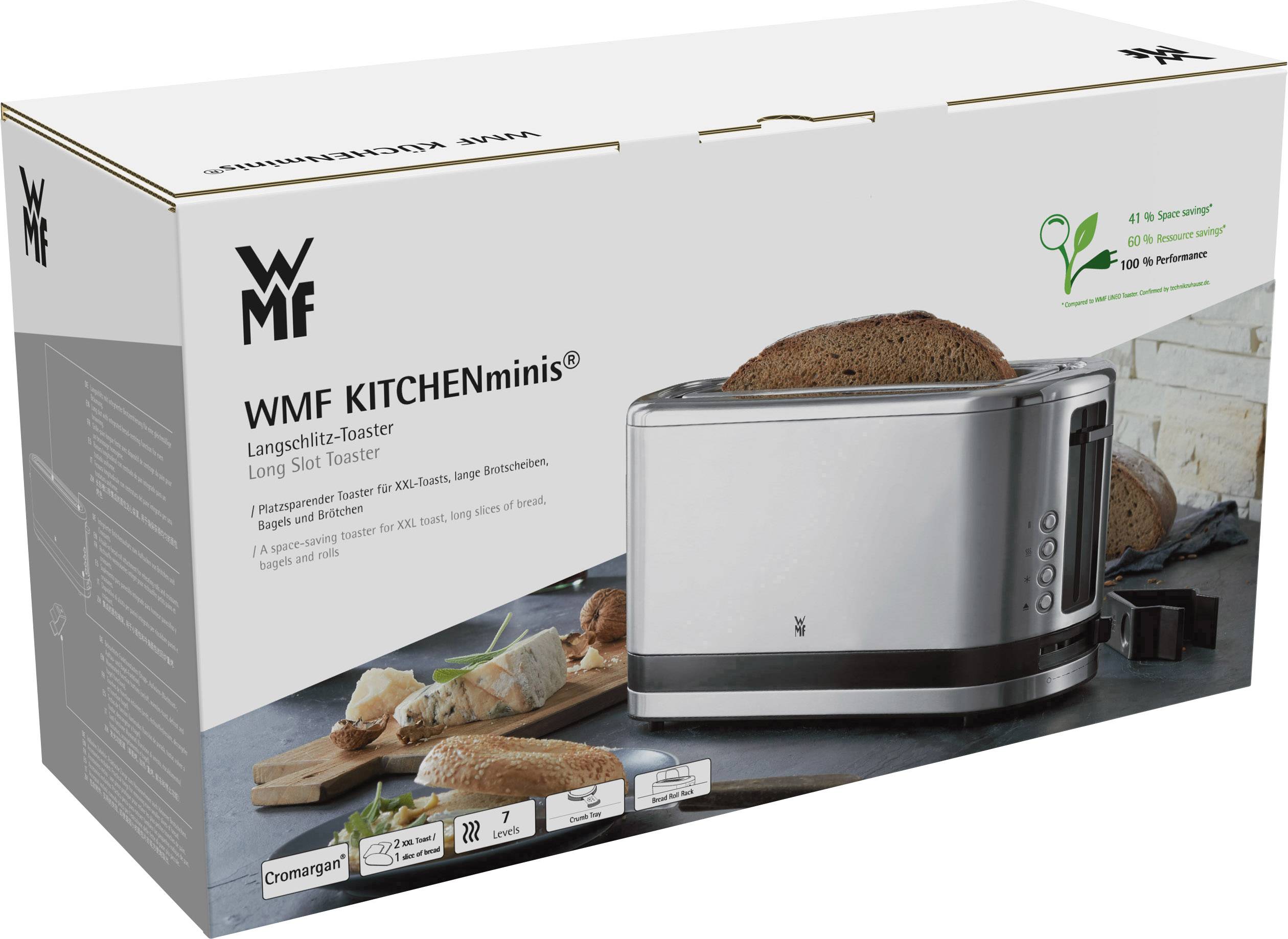 De verpakking van een WMF KITCHENminis broodrooster met lange sleuf toont de broodrooster zelf en boterhamplakken. Voorzien van energiebesparingsaanduiding.