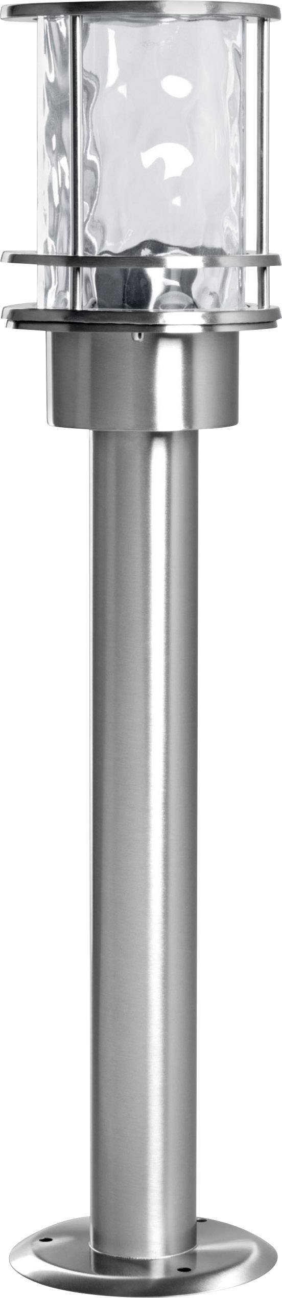 Zilveren buitenlamp met transparante glazen cilinder en metalen voet, ideaal voor tuin- of padverlichting.