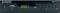 Zwarte digitale set-top-box met USB-aansluiting en LED-display met '0001' erop. Zes toetsen aan de rechterkant zijn zichtbaar.