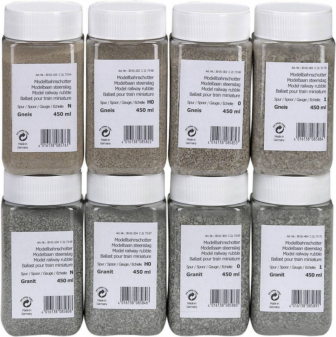 Acht flessen met modelspoorbedding van gneis en graniet, elk 450 ml, met verschillende korrelgroottes voor de inrichting van modelspoorbanen.