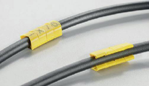 Twee zwarte kabels met gele, gemarkeerde labels ter identificatie; bovenste markering toont '-X76'.