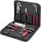 Een open gereedschapsset met meerdere schroevendraaiers, tangen en inbussleutels in een zwarte etui.