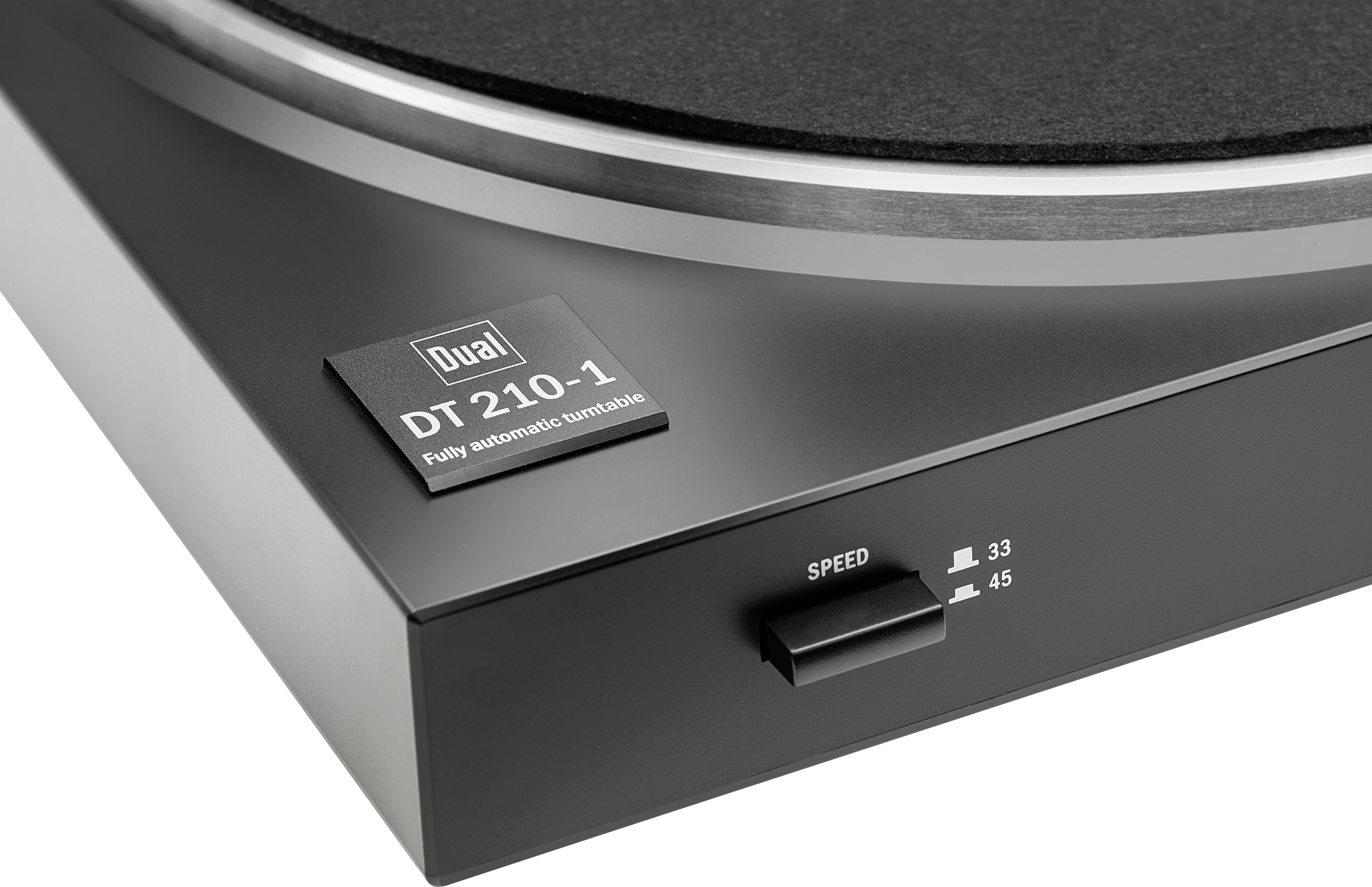 Close-up van een platenspeler, modeltype 'Dual DT 210-1'. De snelheidsregelaar is ingesteld op 33 toeren per minuut.