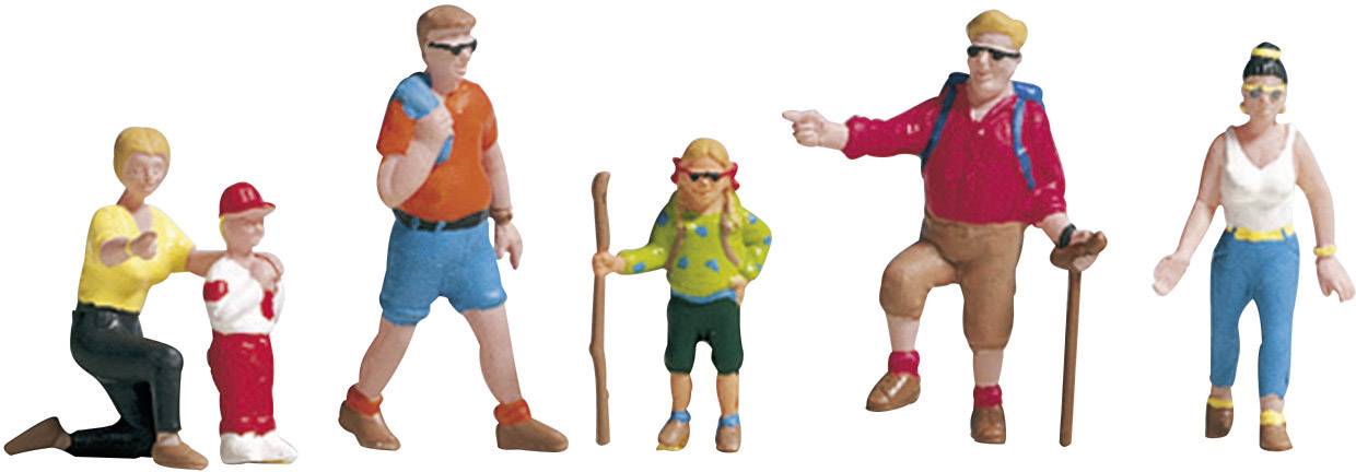 Zes miniatuurfiguren: Een knielend stel met een kind, twee volwassenen met wandelstokken, een kind, een tiener. Ze dragen kleurrijke vrijetijdskleding.