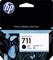 'HP DesignJet 711' inktcartridge in zwart in originele verpakking, versierd met blauwe vlinders op een donkere achtergrond.