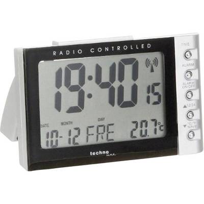 Een digitale radiowekker toont 19:40 uur, 15 seconden. Datum: 10 december. Temperatuur: 20,7°C. Toetsen voor alarmfuncties rechts zichtbaar.