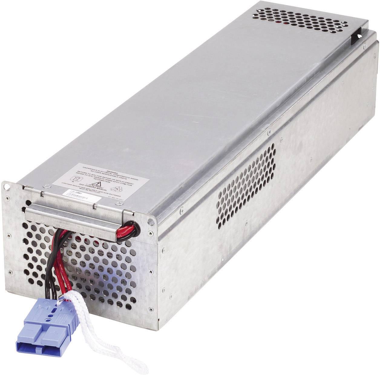 Een rechthoekig, zilver apparaat met ventilatiesleuven en kabels; mogelijk een server-voeding of technisch onderdeel.