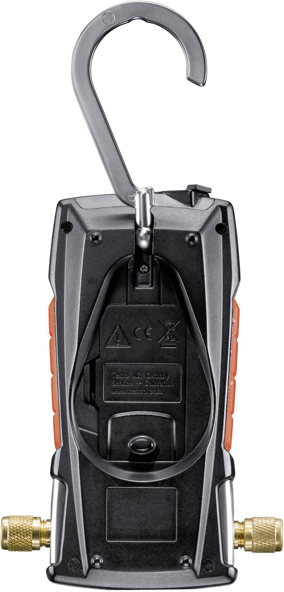 Meetapparaat met haak voor bevestiging, toont achterkant met batterijvak en aansluitingen. Gebruikt in techniek of ambacht.