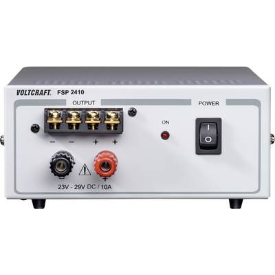 Een voedingsapparaat van Voltcraft, model FSP 2410, met een instelbare DC-uitgang van 23V tot 29V en een maximale stroomsterkte van 10A. Aan-/uitschakelaar rechts.