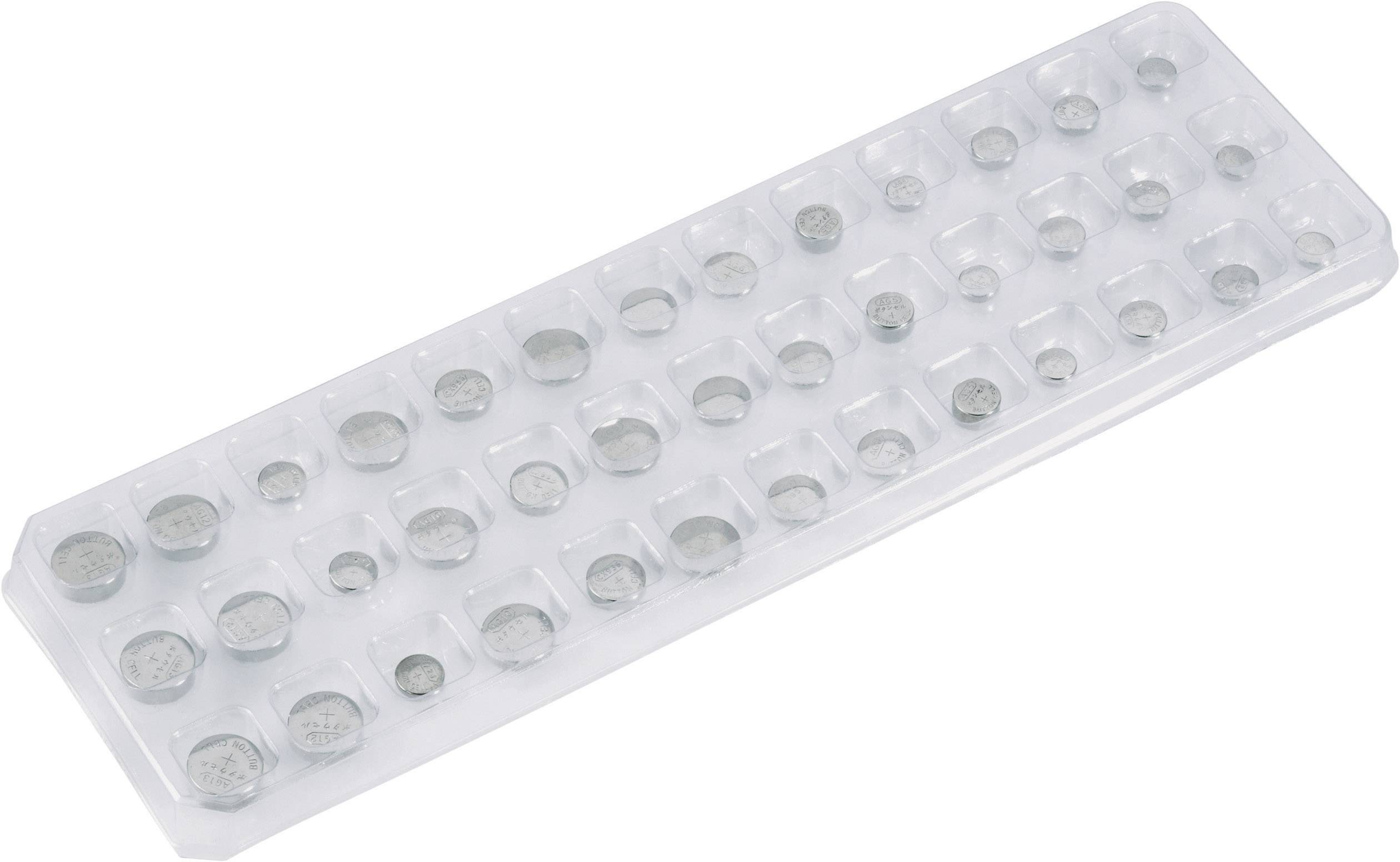 Een doorzichtige ijsschaal met verschillende kleine munten in de vakjes.