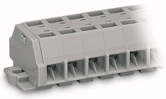 Grijs elektrisch prikbord met meerdere aansluitingen en vierkante openingen, mogelijk bedoeld voor het aansluiten van elektrische draden.