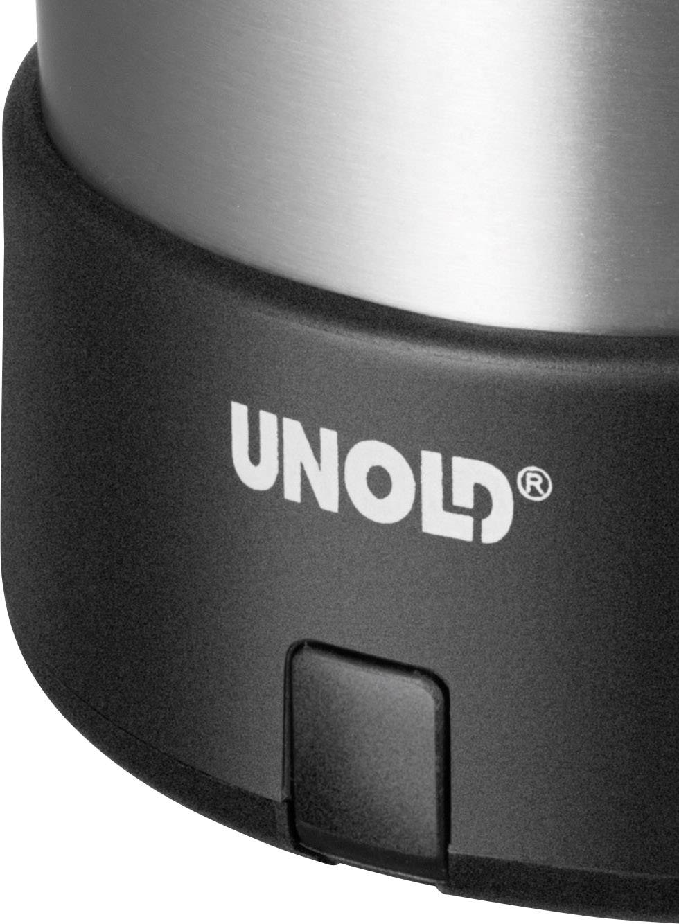 Logo van 'Unold' op zwarte kunststof ondergrond van een metalen huishoudelijk apparaat, close-up.