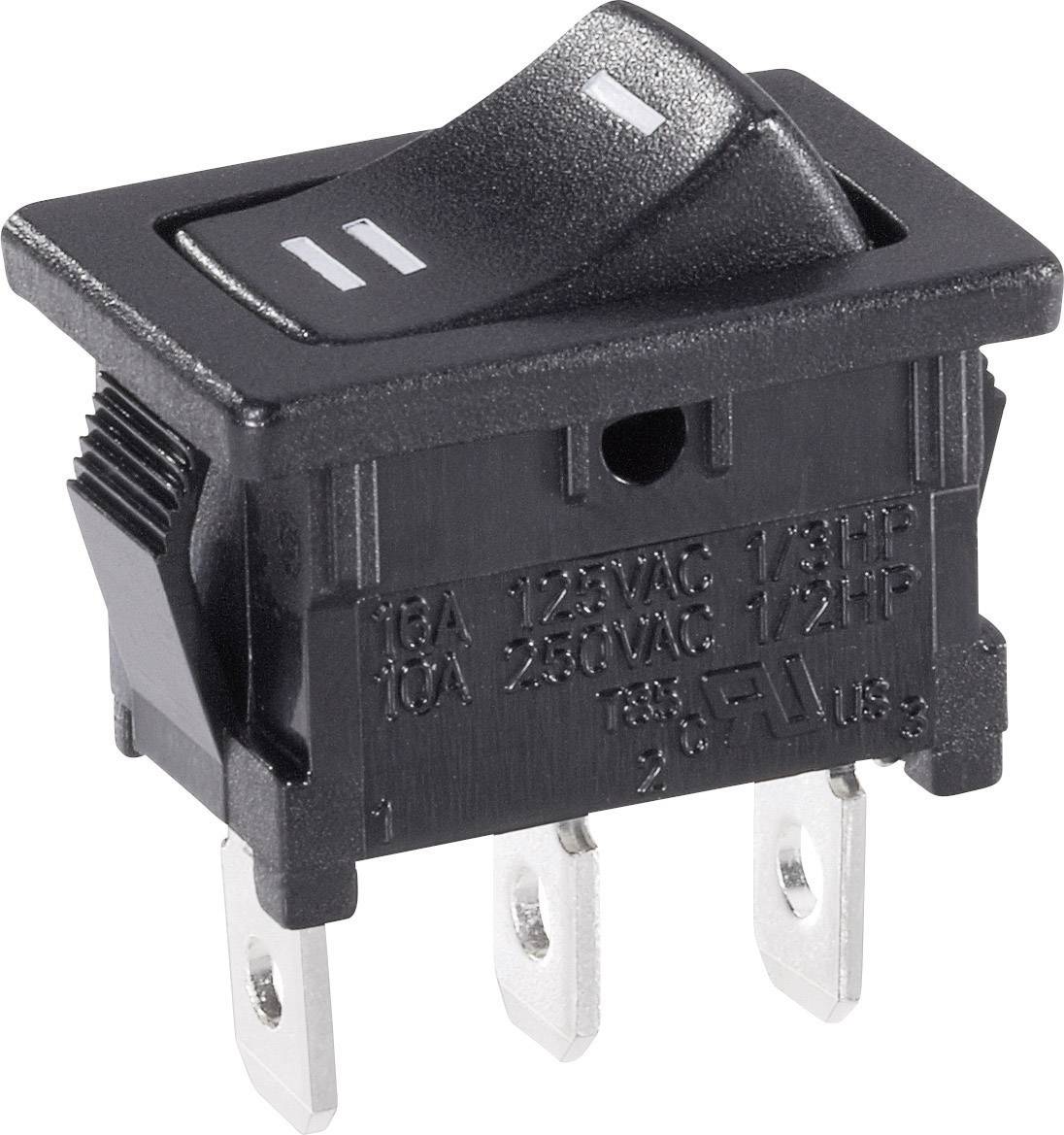 Een zwarte tuimelschakelaar met tuimelschakeling, geschikt voor 18A 125VAC of 10A 250VAC. Opschriften voor elektrisch gebruik.