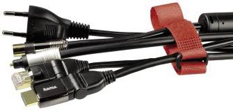 Verschillende kabels, waaronder voedingskabel en audiokabel, gebundeld met een rode klittenband.