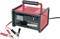'Batterijlader met analoge weergave en klemmen, rood behuizing. Geschikt voor verschillende batterijtypes en laadstromen.'