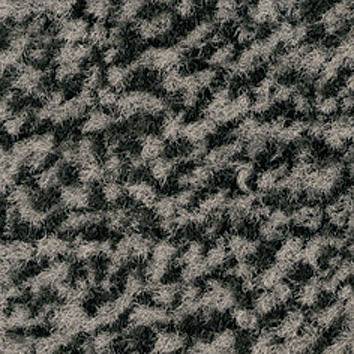 Close-up van een grijs-zwarte textuur die lijkt op een tapijt of stofpatroon met een onregelmatig, pluizig patroon.