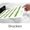 Een hand houdt een vel papier met groene grafieken voor een printer. Daaronder staat het woord 'Afdrukken'.