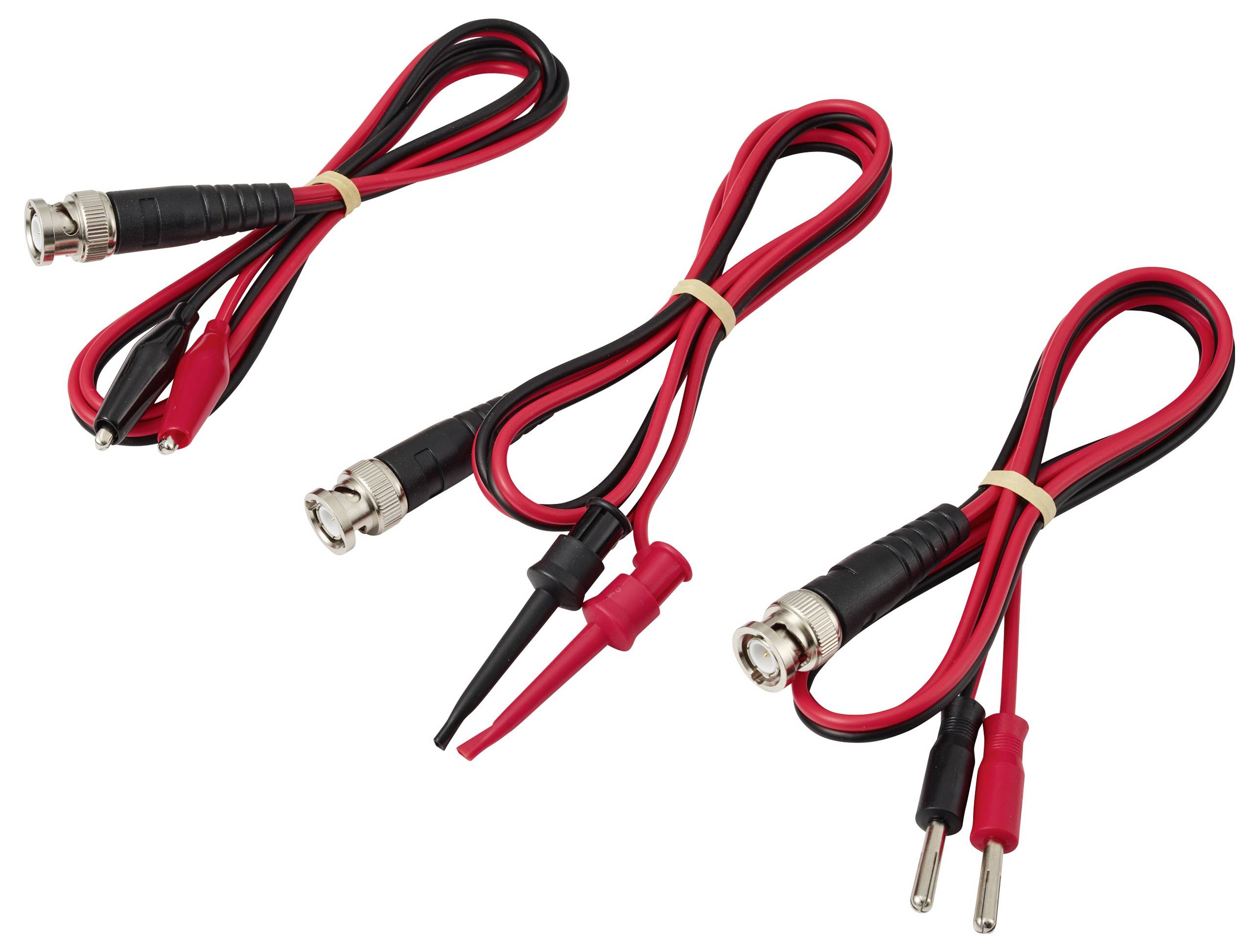 Trzy czerwono-czarne przewody współosiowe z różnymi złączami: klipsy krokodylkowe, wtyki oraz złącze sondy punktowej.