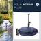 Widok ogrodu z okrągłym, niebieskim napowietrzaczem do stawu na pierwszym planie. Logo i napis: 'AQUA ACTIVE PLUS'.