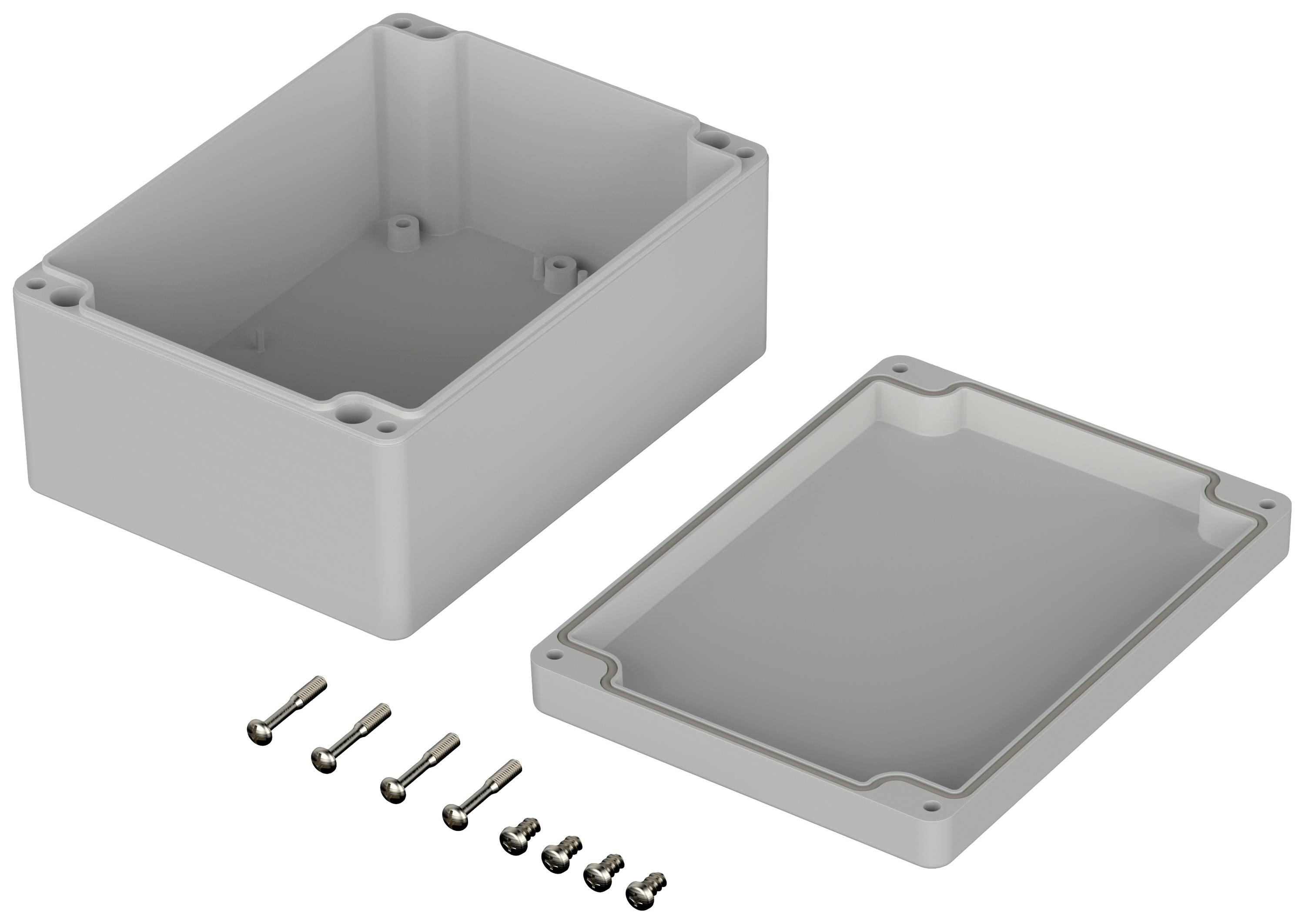 Obudowa z tworzywa sztucznego ze zdjętą pokrywą, obok której leżą śruby mocujące.