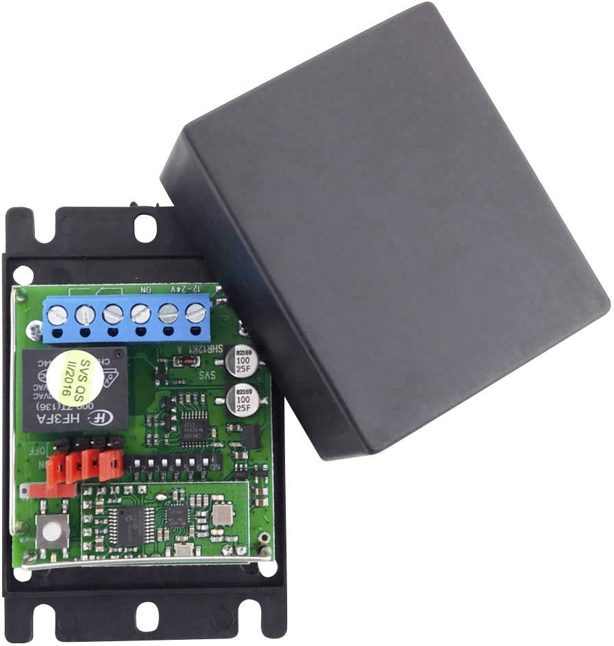 Elektroniczna płytka drukowana z różnymi komponentami i złączami, częściowo zakryta czarną obudową.