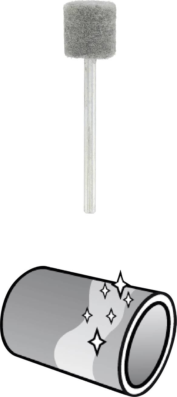 Narzędzie szlifierskie nad lśniącą, czystą rurą. Obraz ilustruje wykorzystanie narzędzia do polerowania powierzchni.