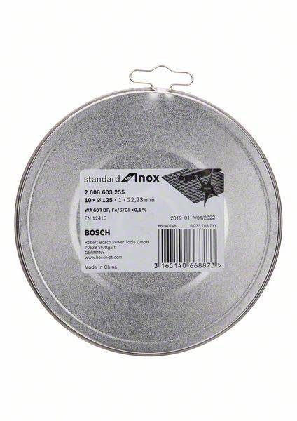 Okrągła tarcza szlifierska firmy Bosch, srebrna, o średnicy 125 mm. Tekst na tarczy: 'standard Inox', numer artykułu, szczegóły producenta.