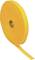 Duża rolka żółtej taśmy, częściowo rozwinięta, na białym tle.