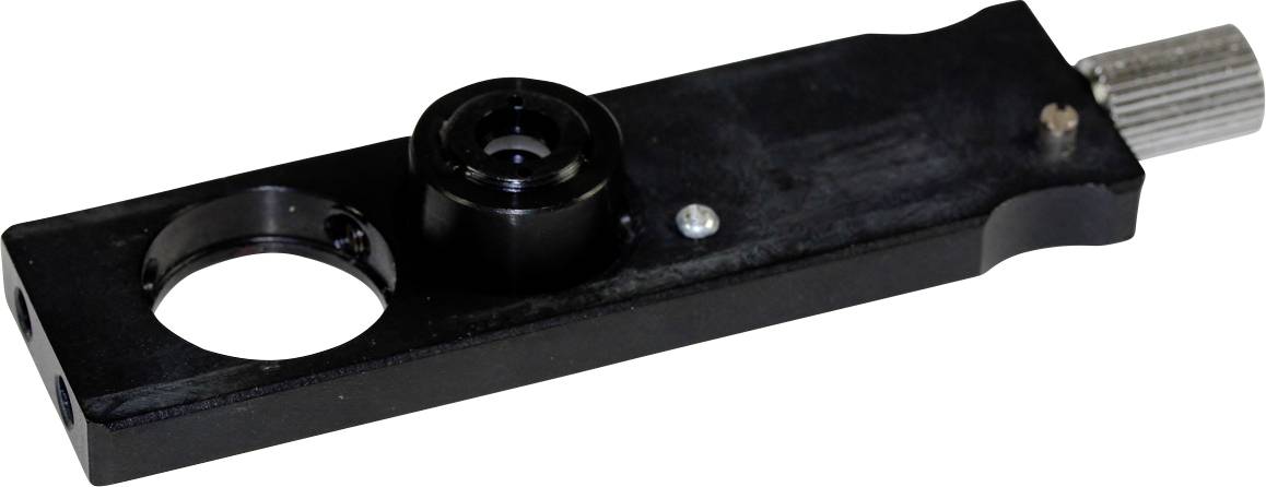 Prostokątne, czarne metalowe narzędzie z dwoma okrągłymi wycięciami i żłobionym metalowym uchwytem.