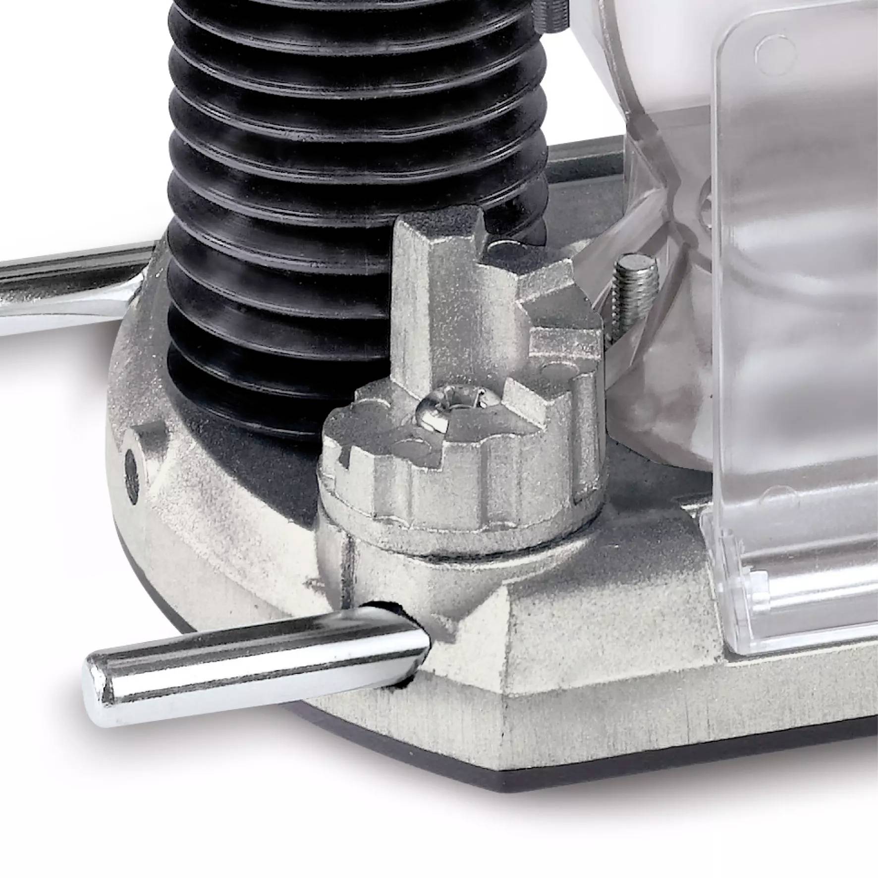 Część metalowej maszyny z dźwignią i kołami zębatymi. Tło jest rozmyte i pokazuje kolejne elementy maszynowe.