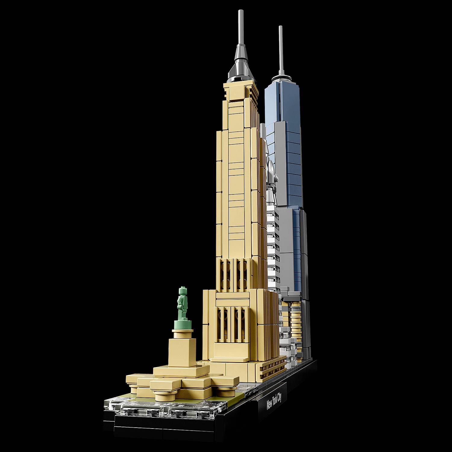 Model z klocków LEGO przedstawia panoramę Nowego Jorku z charakterystycznymi wieżowcami i Statuą Wolności na czarnym tle.