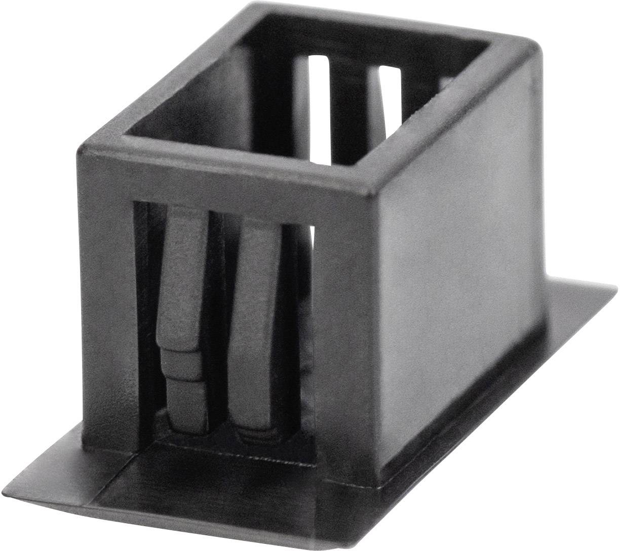 Czarny element z tworzywa sztucznego z prostokątnym otworem i strukturami wewnętrznymi, prawdopodobnie część systemu technicznego.