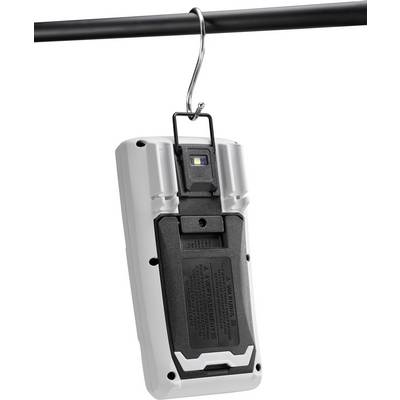 Przenośna lampa robocza wisząca na metalowej rurze, która jest widoczna od tyłu z hakiem i czarną obudową.