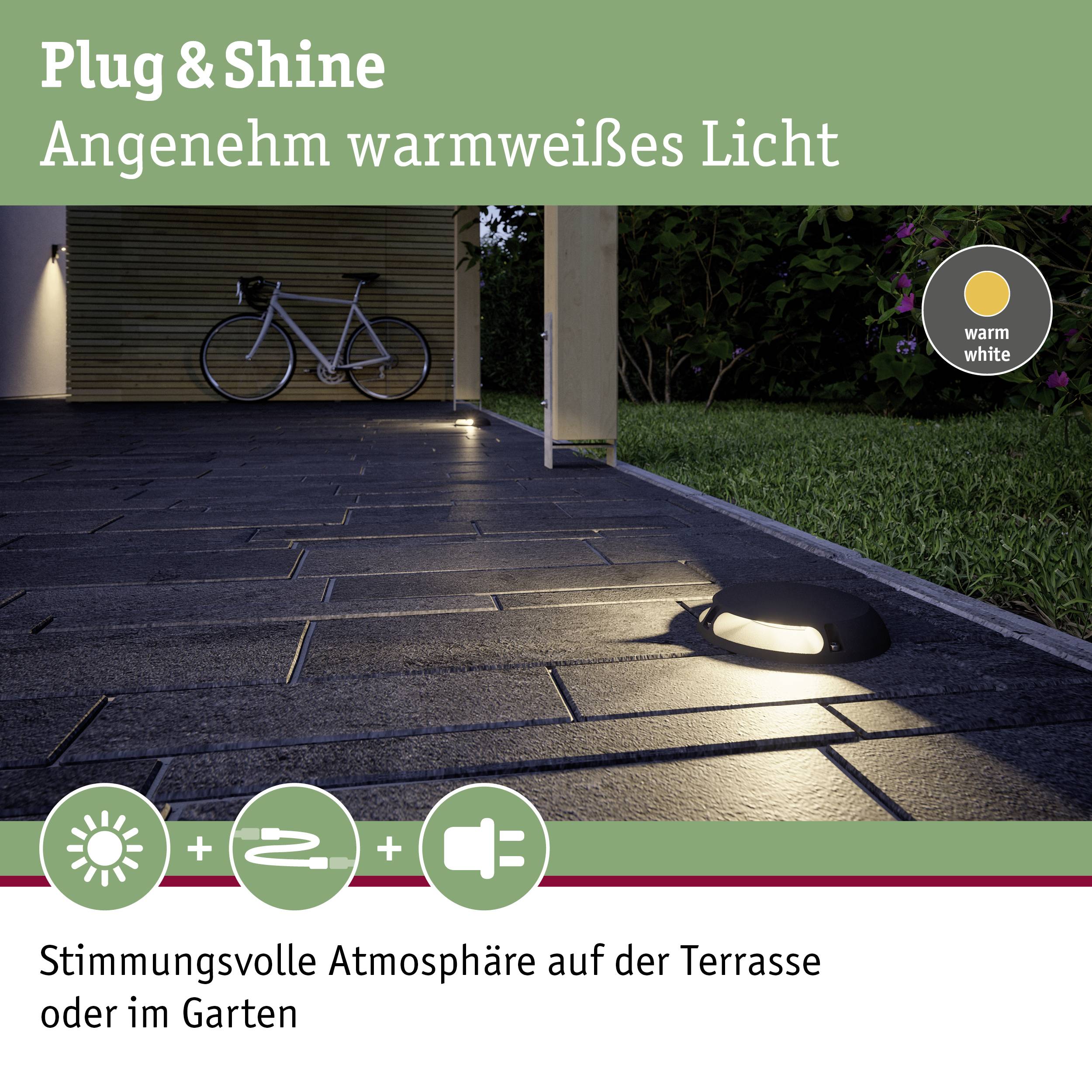 Plug & Shine oświetlenie zewnętrzne rozświetla chodnik ciepłym białym światłem, tworząc nastrojową atmosferę na tarasie lub w ogrodzie.