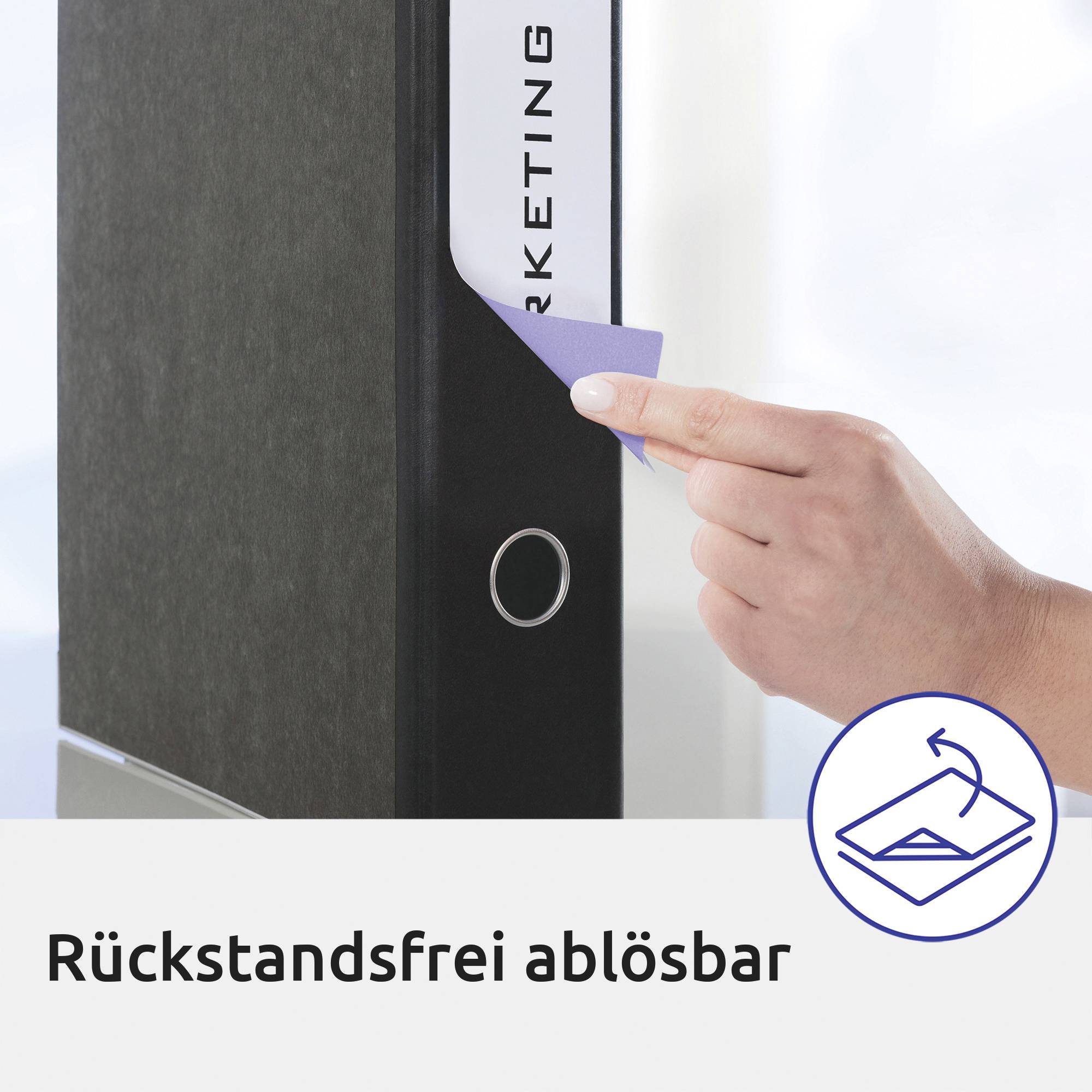 Dłoń wyciąga niebieski segregator z napisem 'Marketing' z półki. Tekst poniżej: 'Całkowicie usuwalne bez pozostałości'.