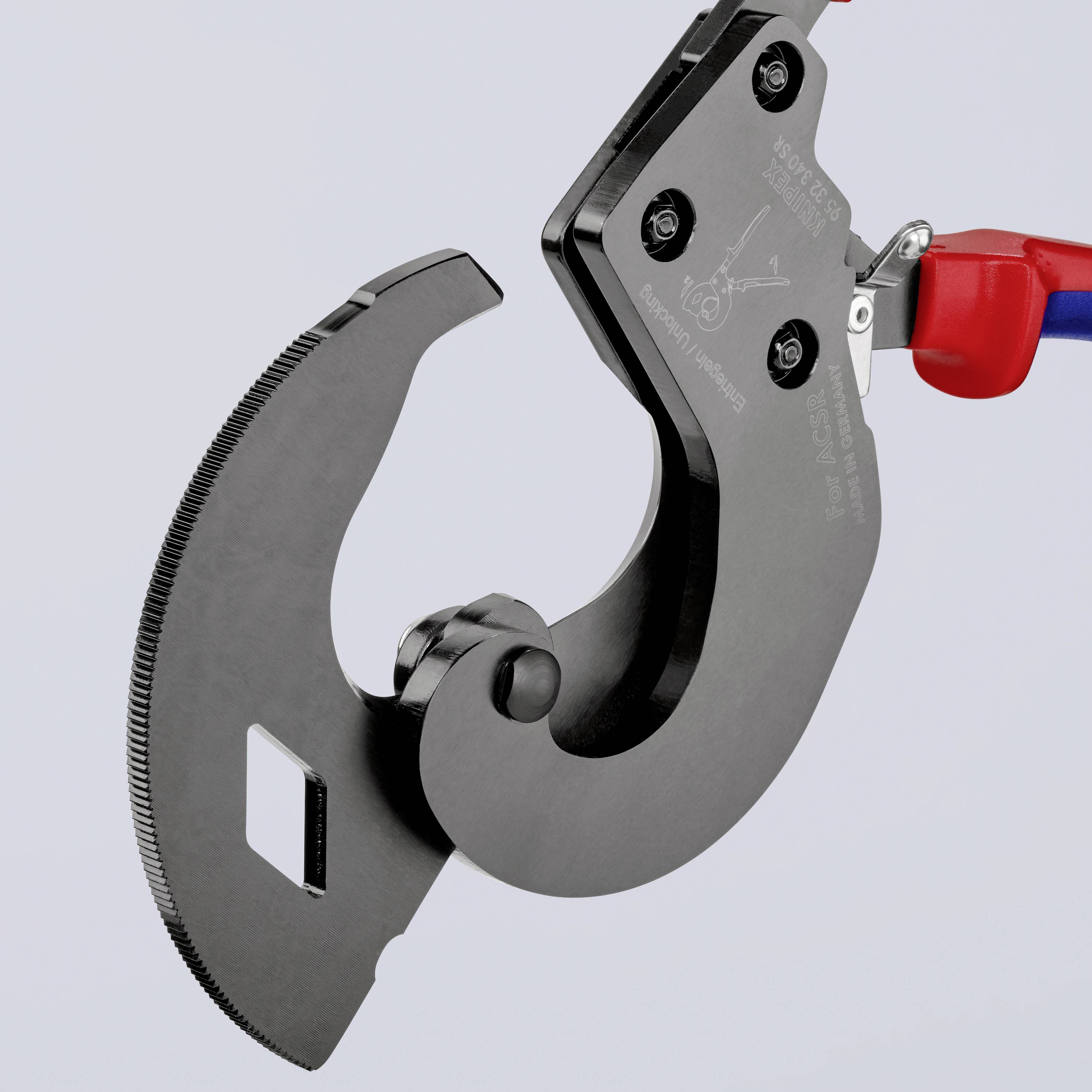 'Czarny element maszyny z dużym, zakrzywionym hakiem i czerwono-niebieskim uchwytem.'