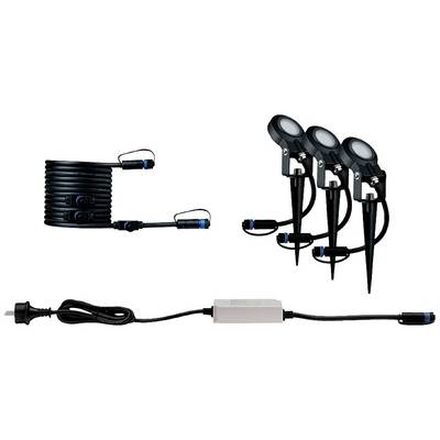 Trzy lampy LED do ogrodu z grotami montażowymi, połączone przewodami i adapterem. Idealne do oświetlenia przestrzeni zewnętrznych.