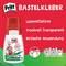 Butelka kleju 'Pritt Bastelkleber' na zielonym tle. Tekst: 'Bez rozpuszczalników, Wysycha przezroczyście, Łatwy w użyciu'. Symbole 'Linii' i 'Punktów i powierzchni'.