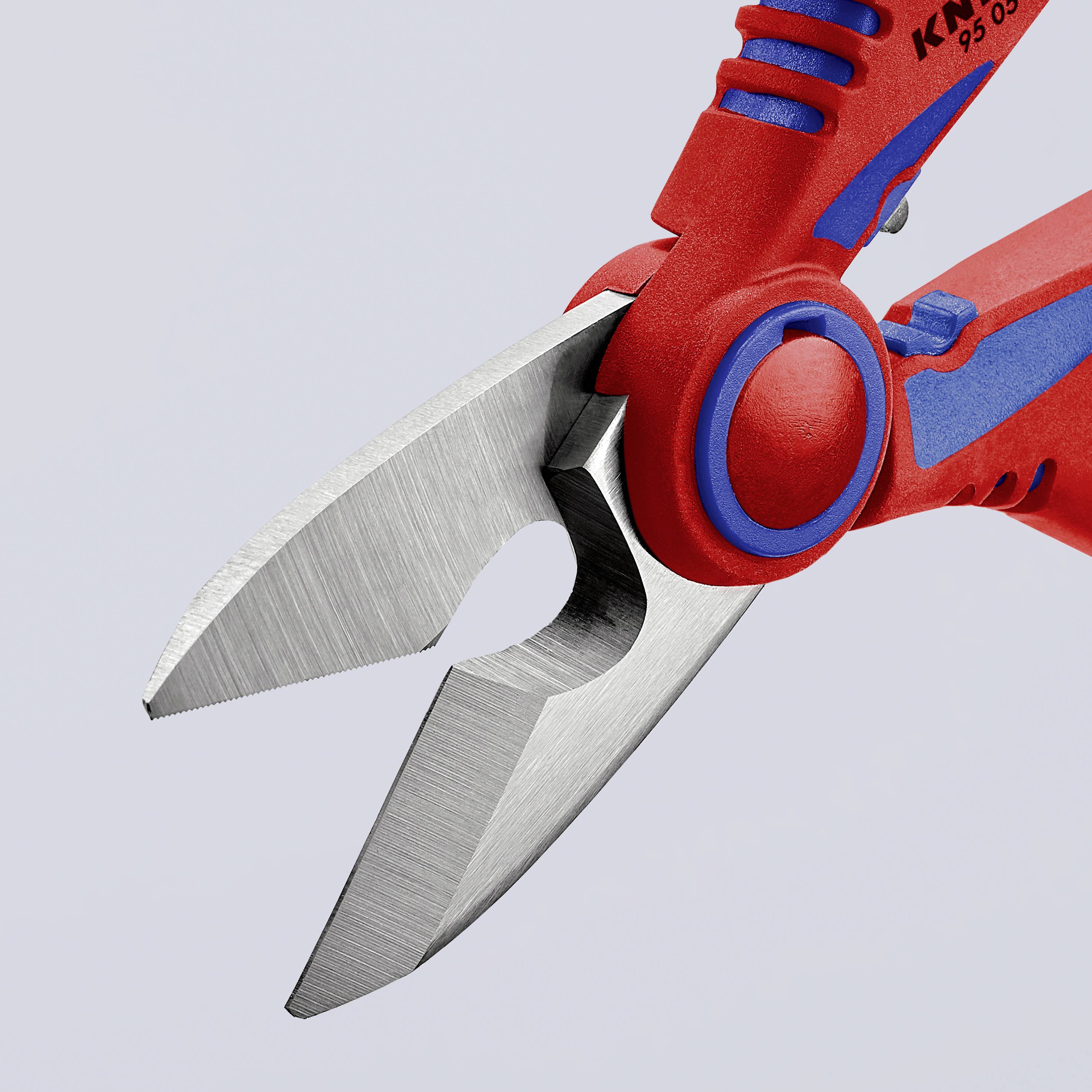 Na ilustracji widać czerwone, poręczne szczypce z niebieskim uchwytem i ostrymi ostrzami, nadające się do cięcia przewodów lub kabli.