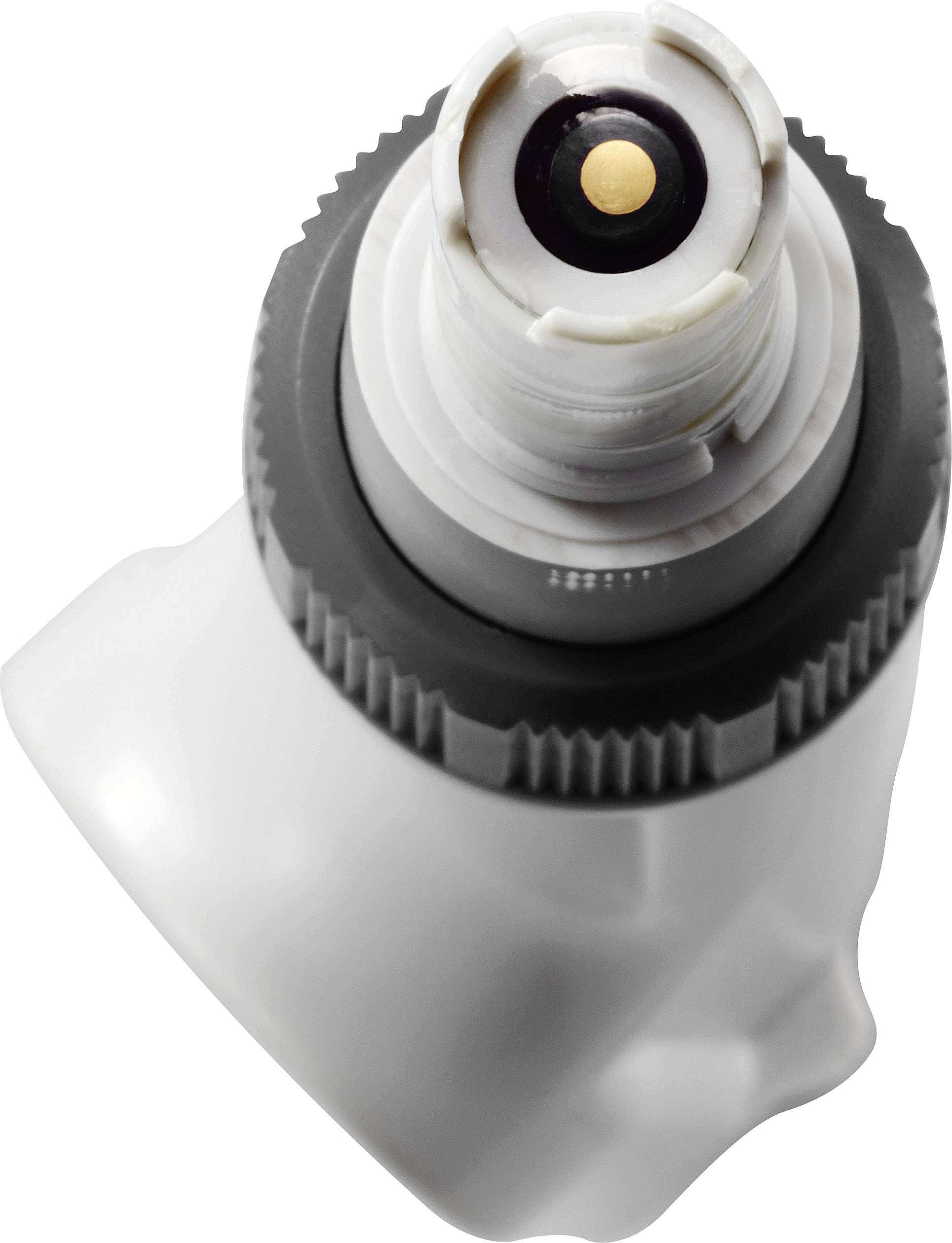 Zbliżenie białego, prostokątnego zamknięcia butelki z okrągłym, czarnym otworem pośrodku, otoczonym szarym obrzeżem.