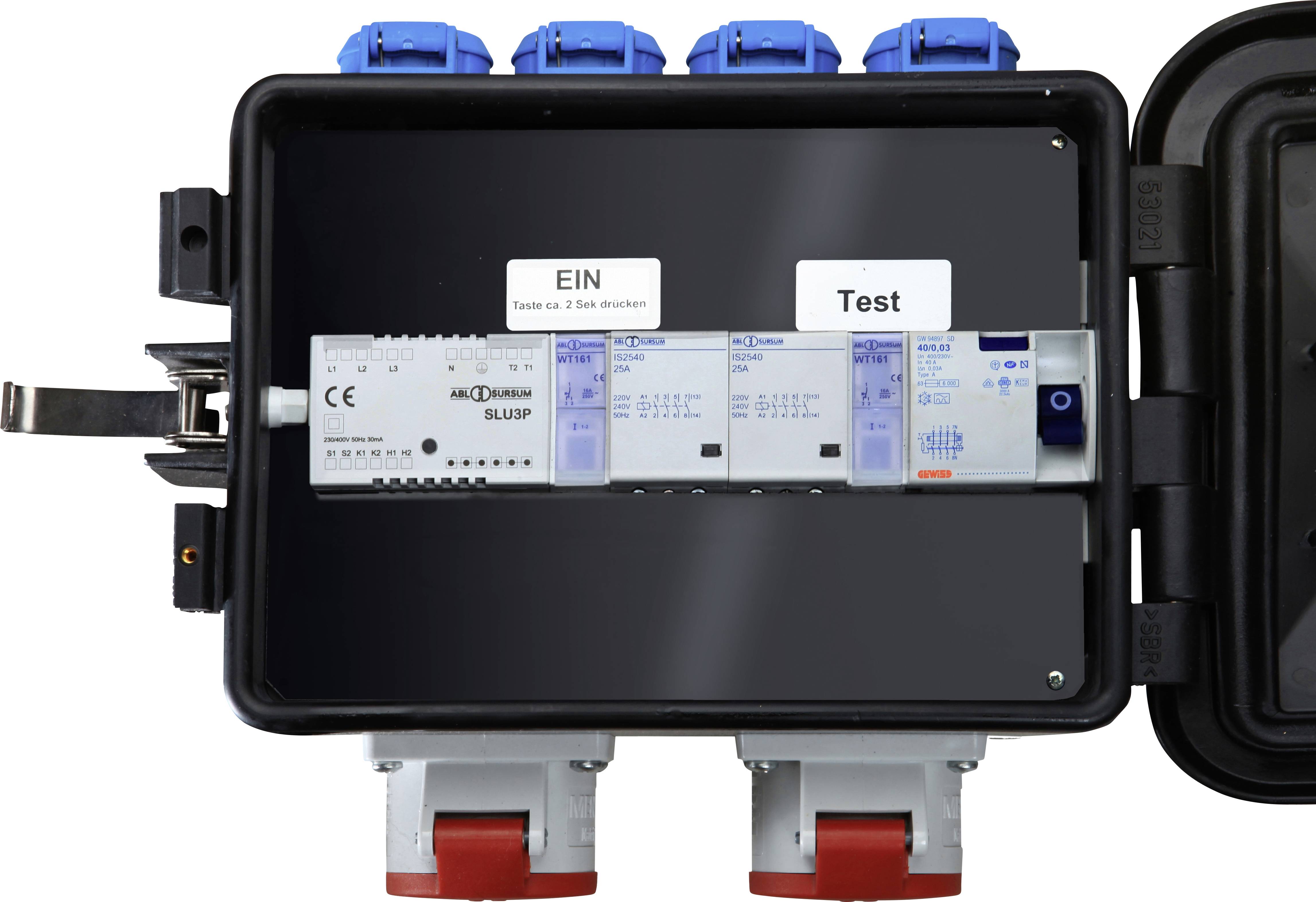 'Szafa sterownicza z niebieskimi i czerwonymi gniazdami przyłączeniowymi. Oznaczenia: WŁ., Test. Zawiera różne komponenty elektroniczne.'